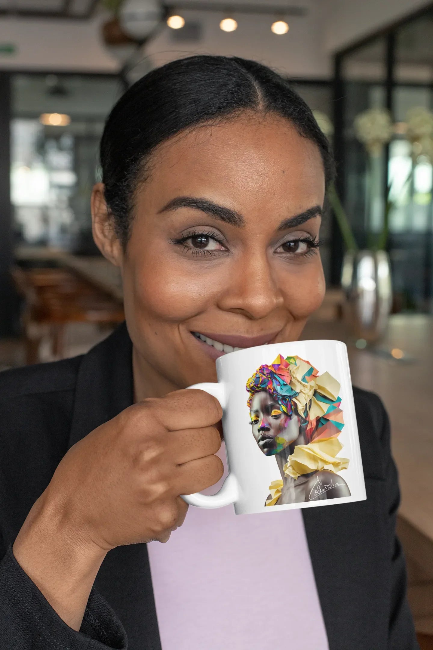 woman holding a nice colorisha coffee mug